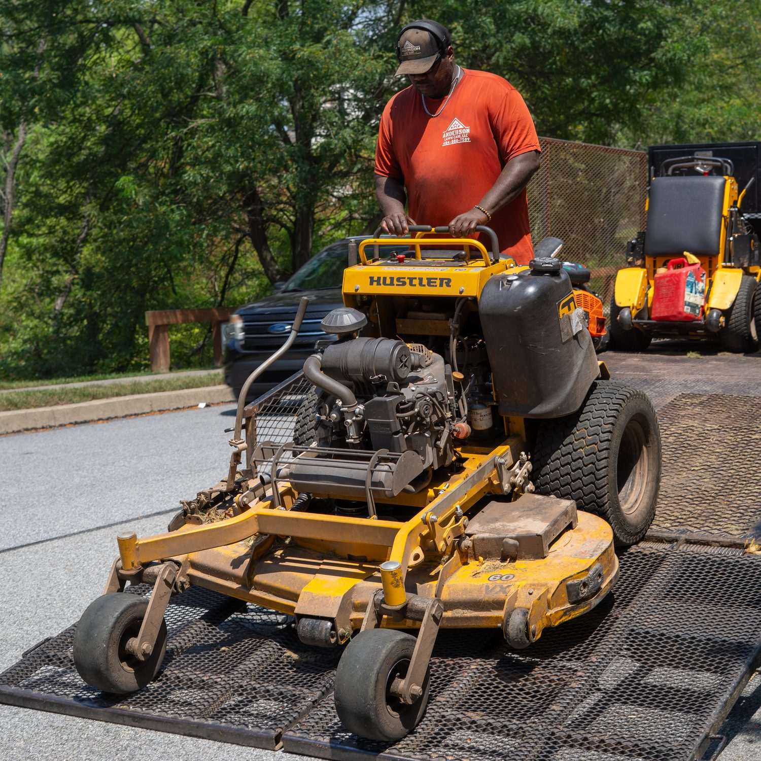 Anderson Lawn Care mowers loaded on the trailer